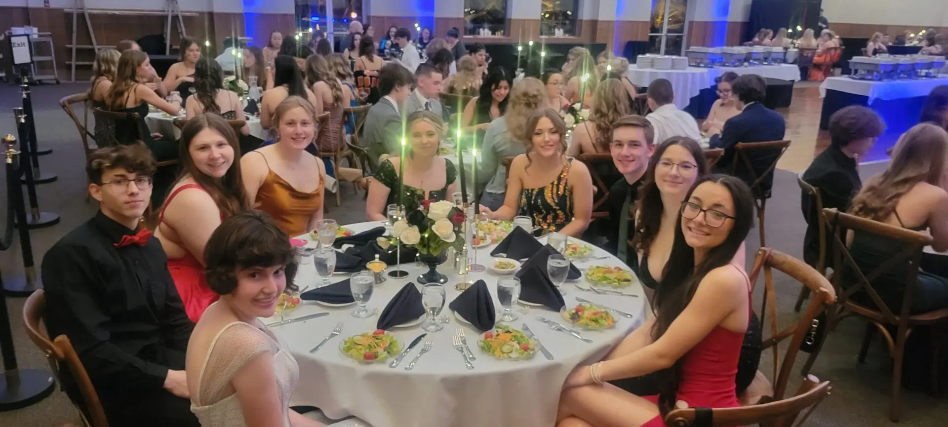 Group of friends enjoying a festive dinner.