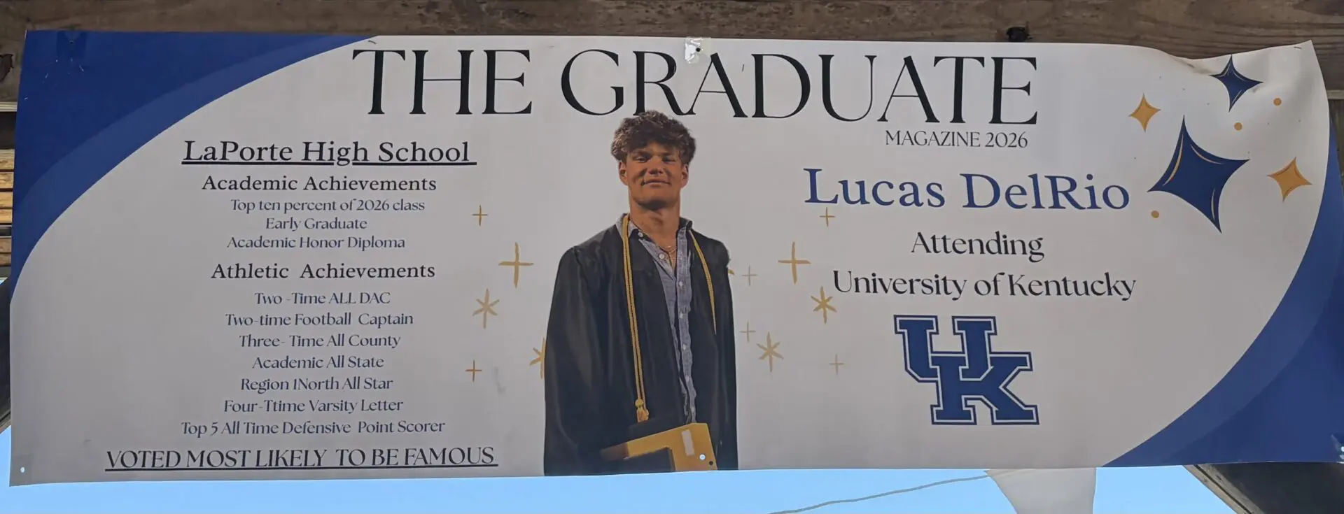 Graduation banner celebrating academic and athletic achievements.