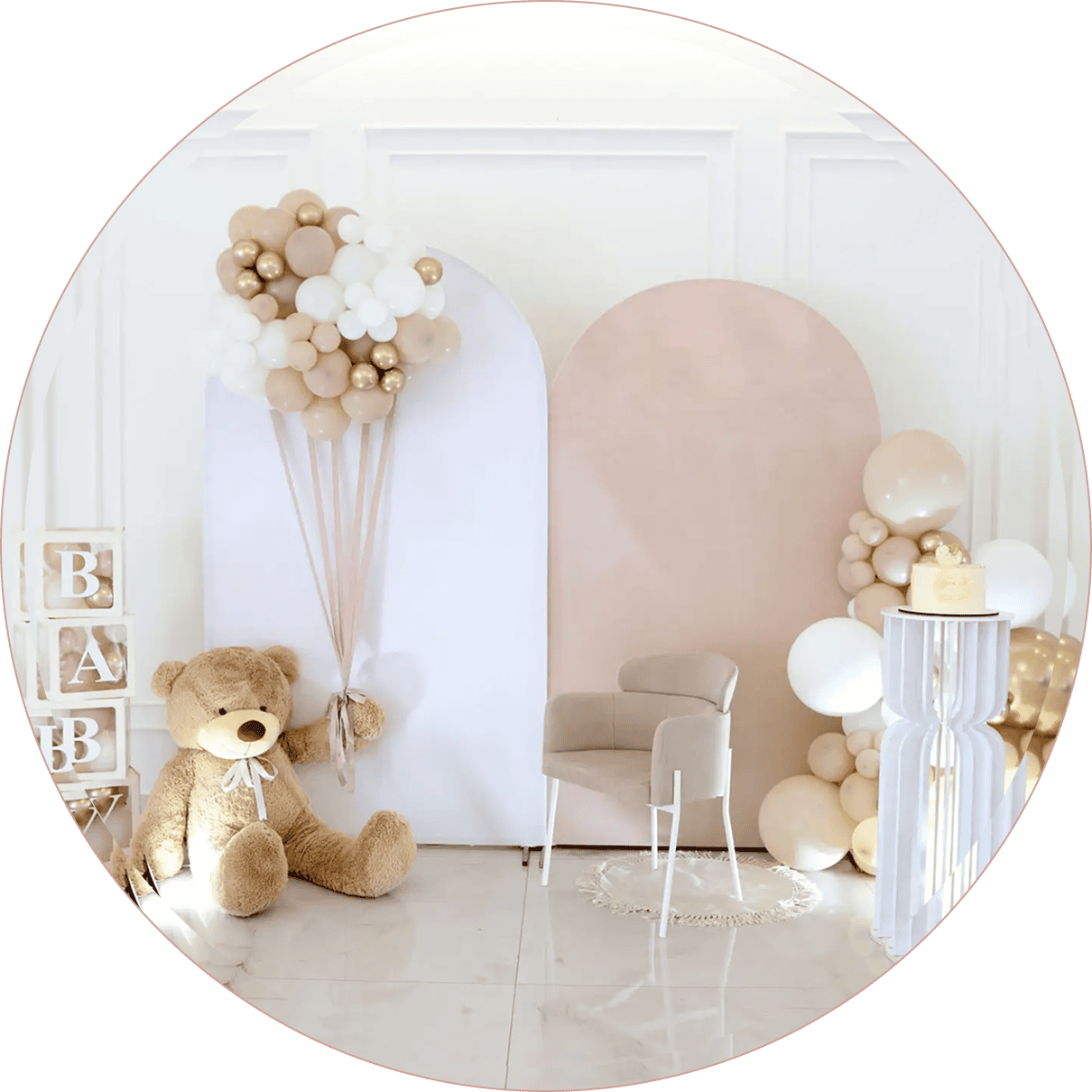 Charming baby celebration setup with balloons and decor.