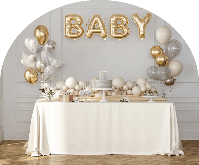 Festive baby shower table with balloons and cake.