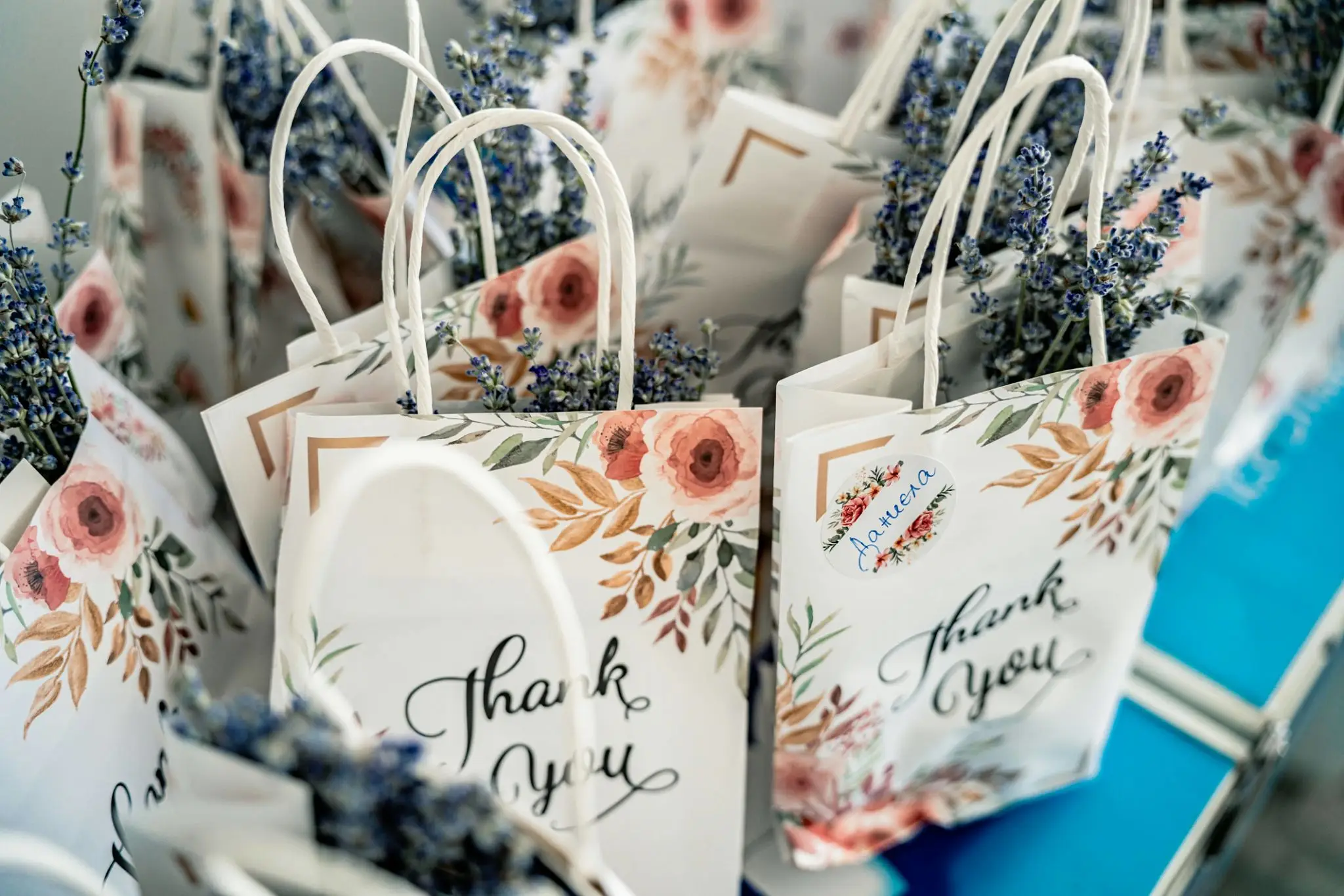 Floral gift bags with lavender accents.
